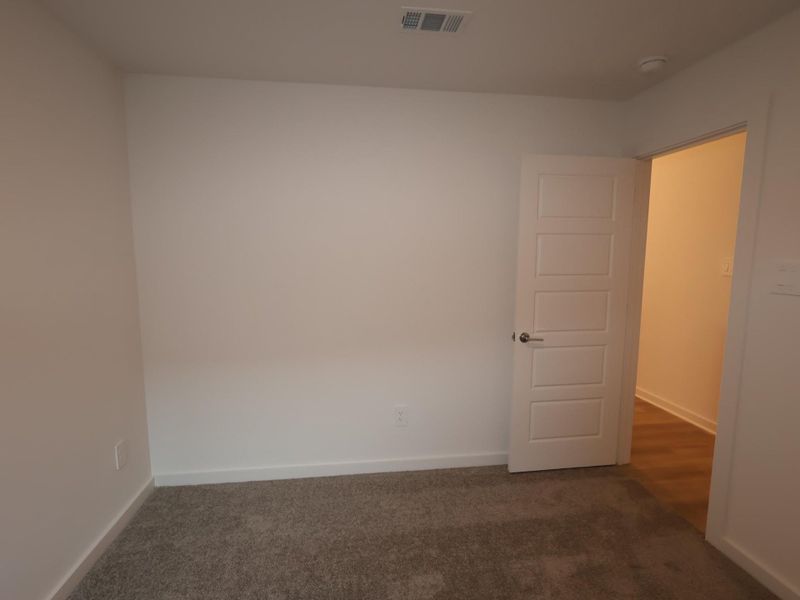 Spacious, unfurnished interior of a new home in Pinewood at Grand Texas, New Caney (Image 25).