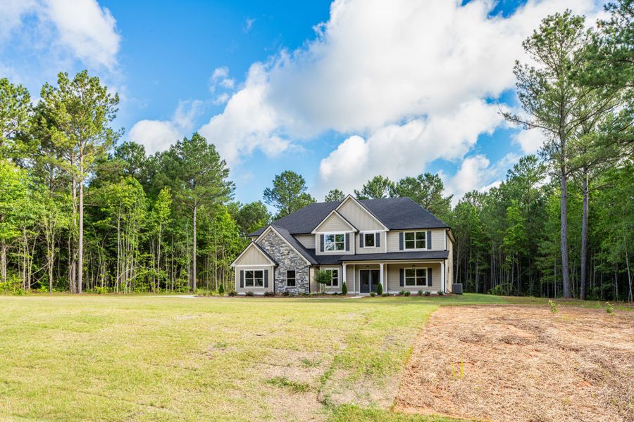 Front exterior of a new home in Flint Farms, Concord, GA, highlighting curb appeal (Image 27).