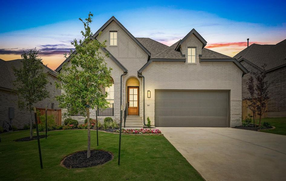 Front exterior of a new home in 6 Creeks at Waterridge: 55ft. lots, Kyle, TX, highlighting curb appeal (Image 16). Front exterior of a new home in 6 Creeks at Waterridge: 55ft. lots, Kyle, TX, highlighting curb appeal (Image 16).
