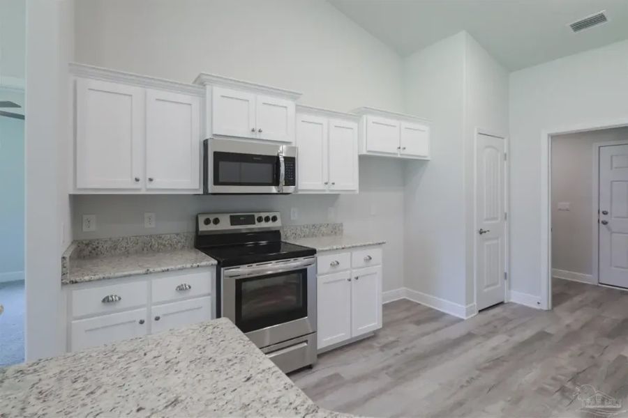 Furnished interior view inside a new home in Blossom Grove, Milton (Image 3).