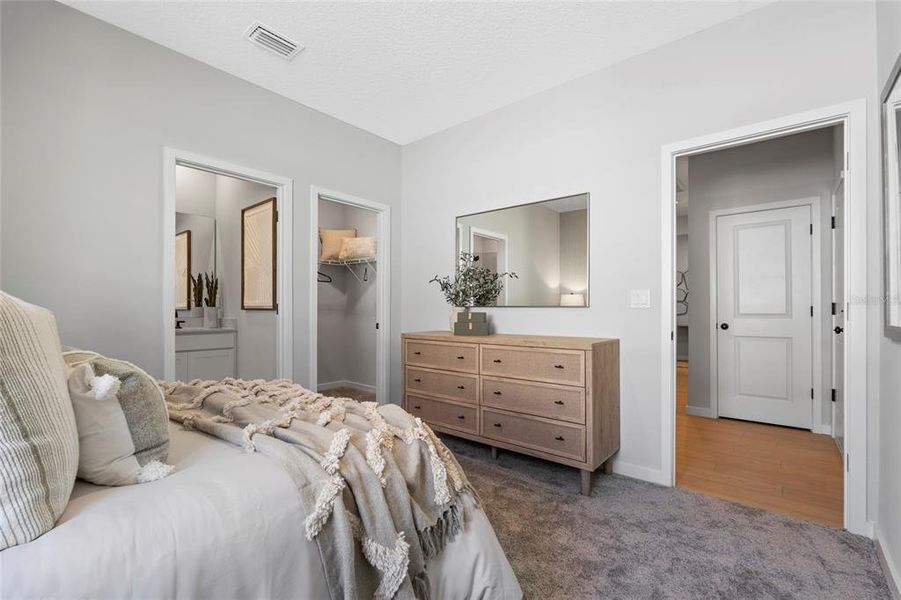 Furnished interior view inside a new home in The Cypress Series at Reserve East, Flagler Beach (Image 17).