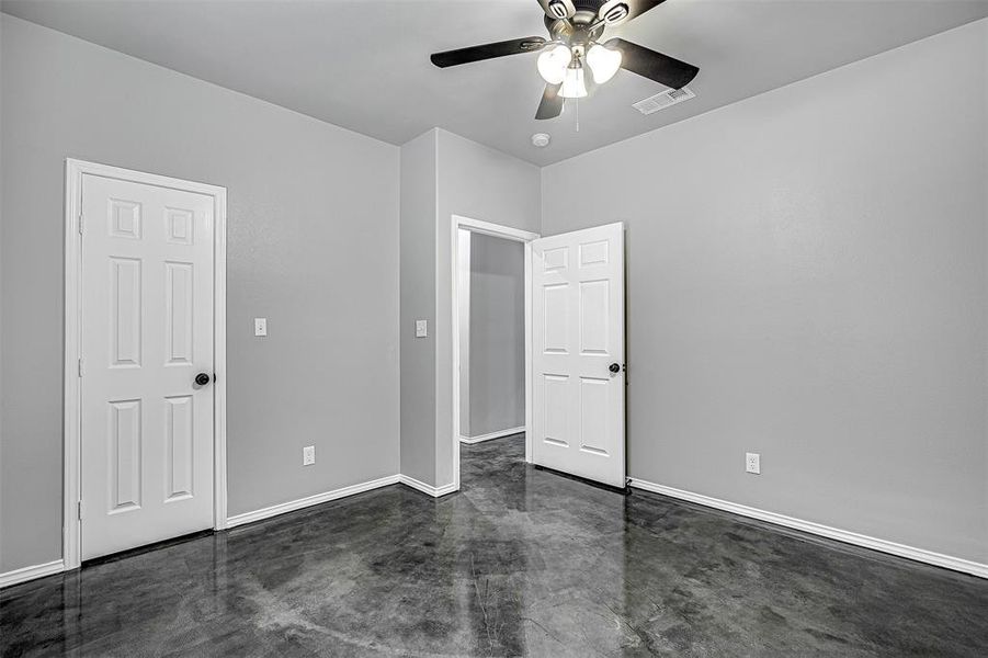 Unfurnished room with ceiling fan