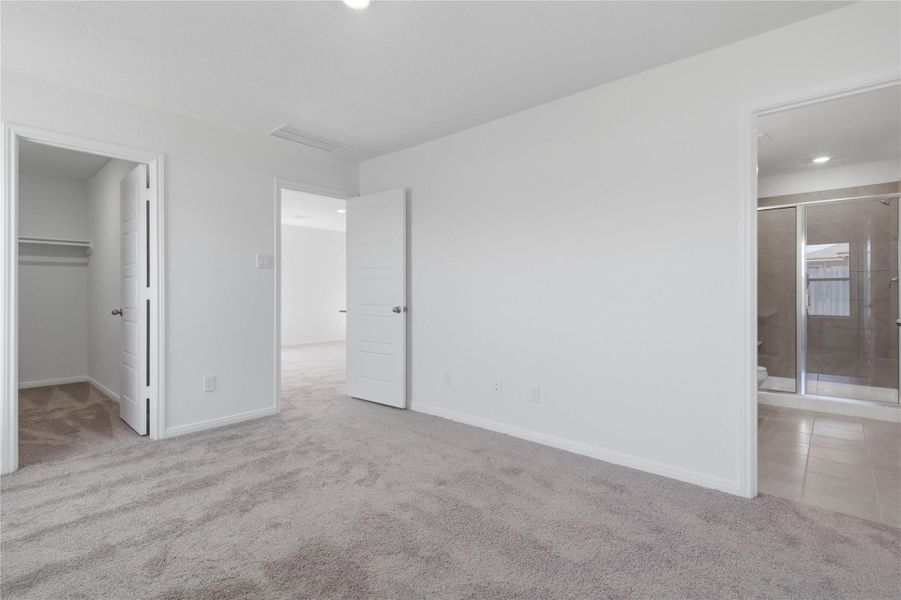 Look at this immaculate closet! With high shelving, multiple rows to hang clothing, you are sure to have enough room for all your belongings!