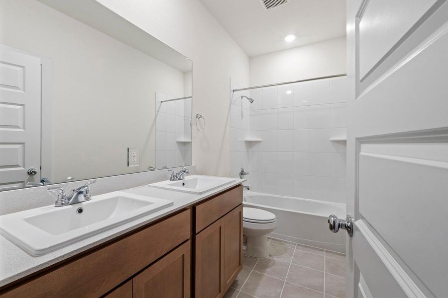 Furnished interior view inside a new home in Prairie Winds, Hutto (Image 14).