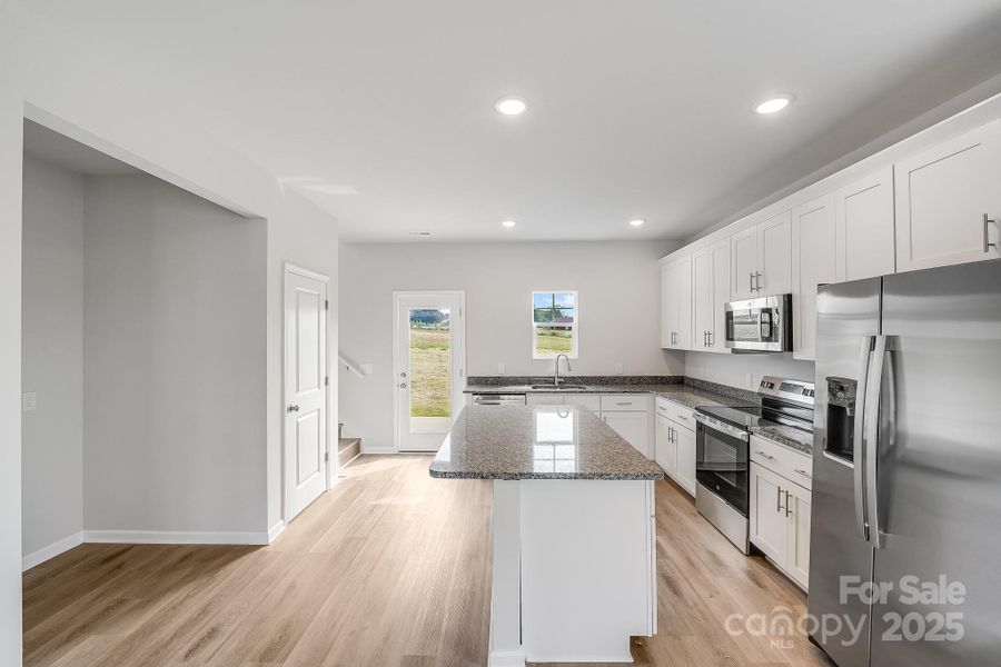 Furnished interior view inside a new home in , Statesville (Image 17).