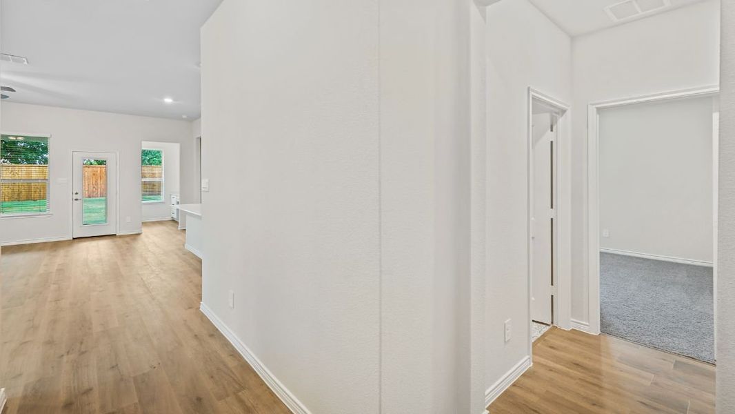 Representative unfurnished interior of a home built from the Durango by D.R. Horton in The Landing at Hidden Lakes, McKinney (Image 12). Representative unfurnished interior of a home built from the Durango by D.R. Horton in The Landing at Hidden Lakes, McKinney (Image 12).