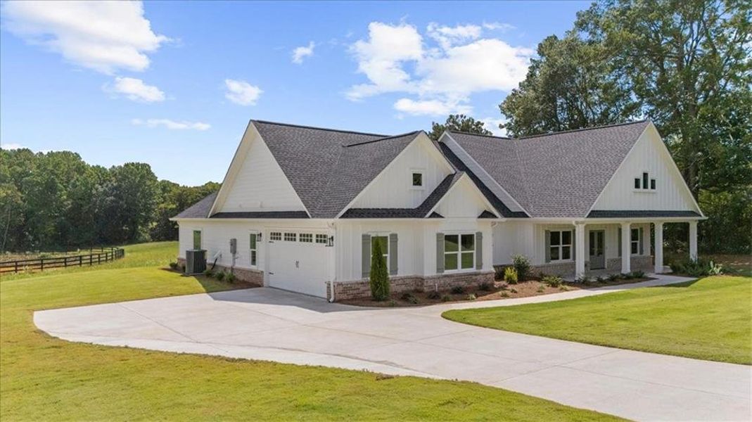 Front exterior of a new home in , Cumming, GA, highlighting curb appeal (Image 33).