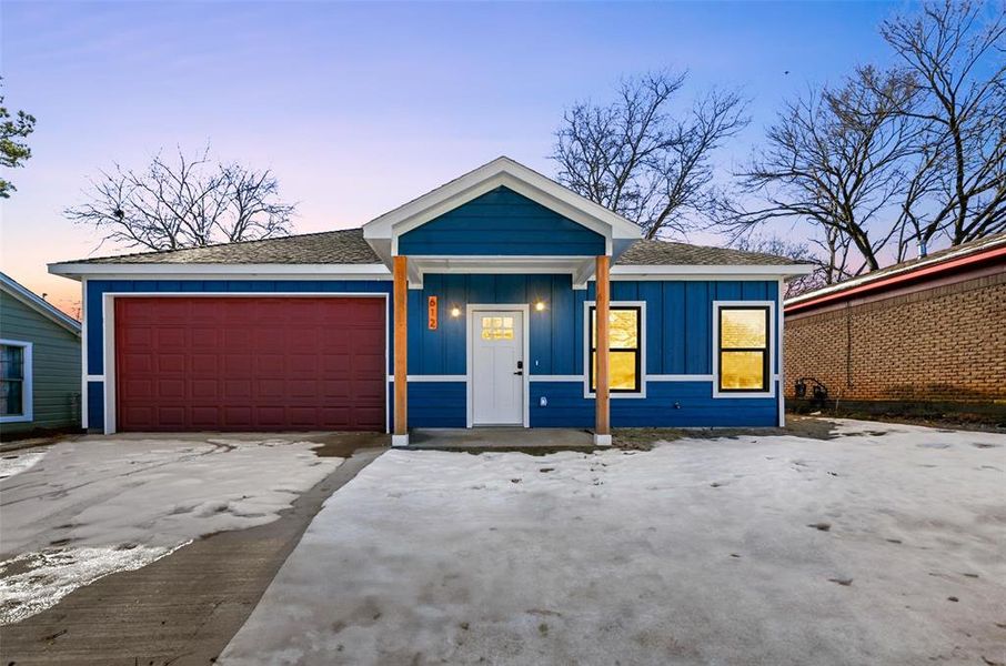 View of front facade with a garage