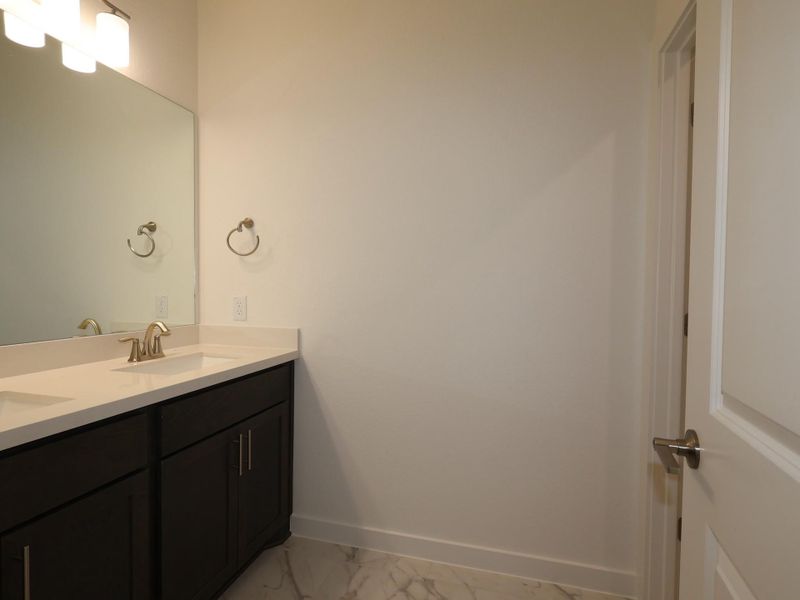 Furnished interior view inside a new home in Edgewood, Leander (Image 12). Furnished interior view inside a new home in Edgewood, Leander (Image 12).