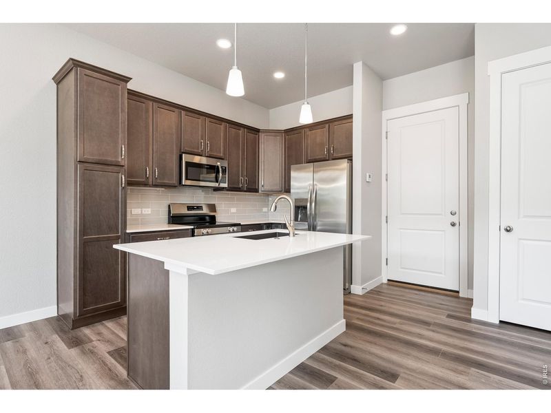 Furnished interior view inside a new home in The Lakes at Centerra, Loveland (Image 10).