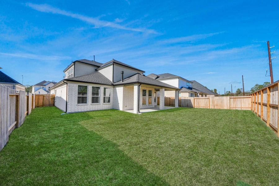Explore the expansive backyard with its inviting covered patio—a perfect blend of space for the kids to play and adults to unwind. Ideal for creating your outdoor oasis, this backyard accommodates patio furniture, a BBQ pit, and endless possibilities for leisure and entertainment.