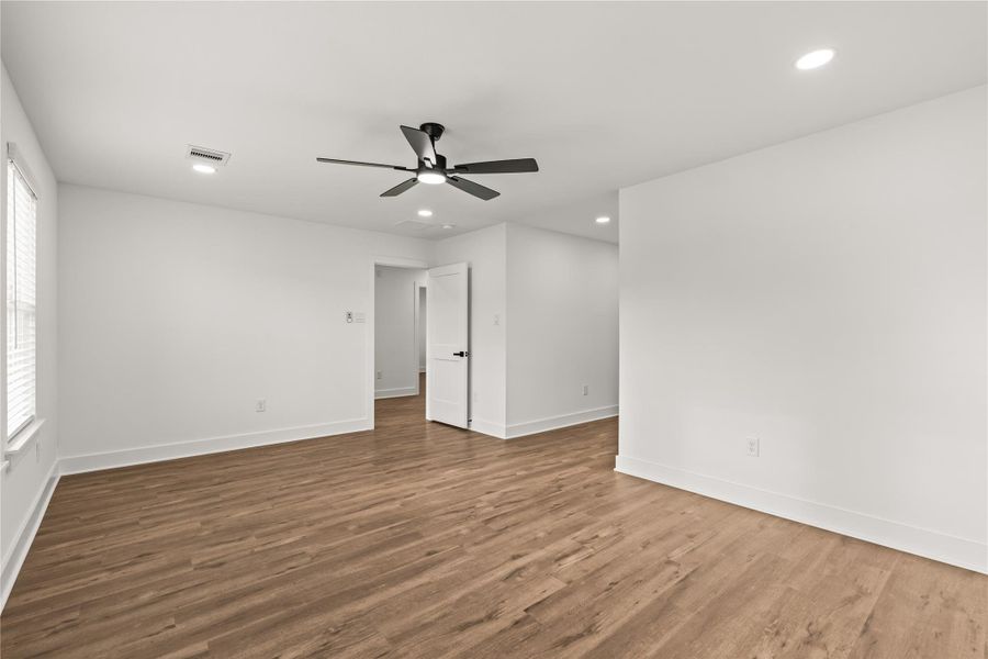 Versatility at its finest. This bright secondary bedroom offers the perfect layout for a premium home office, a creative studio, or a guest suite.