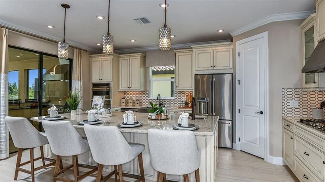 Furnished interior view inside a new home in Esplanade at Wiregrass Ranch, Wesley Chapel (Image 5).