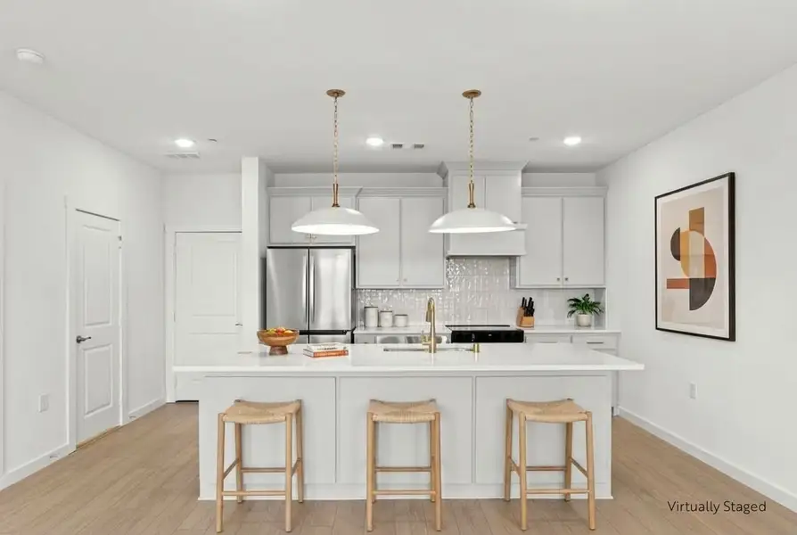 Furnished interior view inside a new home in Wildridge, Oak Point (Image 3).