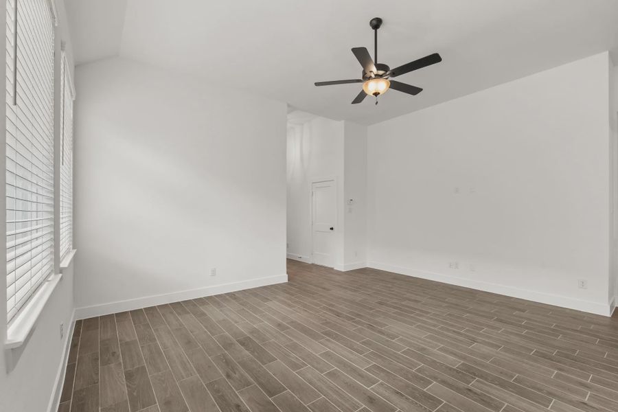 Representative unfurnished interior of a home built from the Rowen by Chesmar Homes in Brookewater 45's, Rosenberg (Image 13).