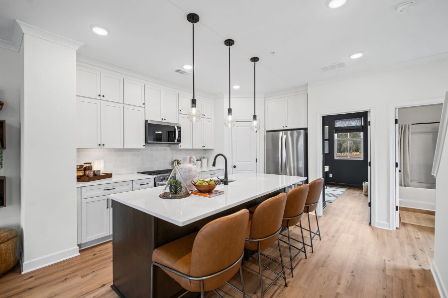 Representative furnished interior of a home built from the The Greenfield by JW Collection in The Village at River Green, Canton (Image 10).
