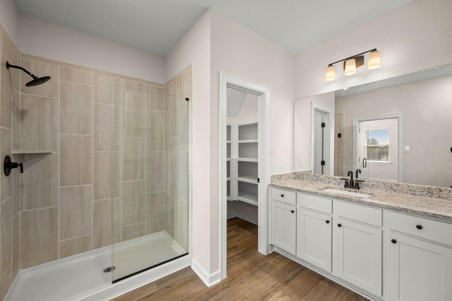 Furnished interior view inside a new home in Sunterra, Katy (Image 6).