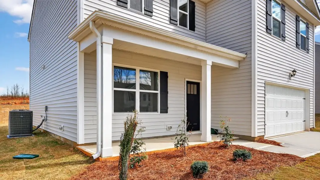 Exterior details and patio area of a home in Swift Creek Farm, Clayton (Image 2). Exterior details and patio area of a home in Swift Creek Farm, Clayton (Image 2).