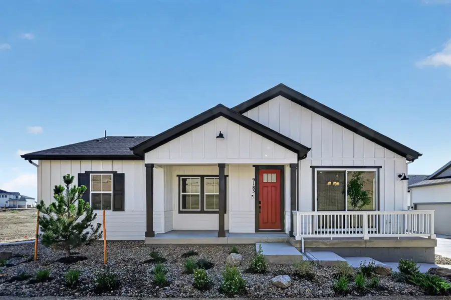 Front exterior of a new home in Trailstone, Arvada, CO, highlighting curb appeal (Image 1). Front exterior of a new home in Trailstone, Arvada, CO, highlighting curb appeal (Image 1).