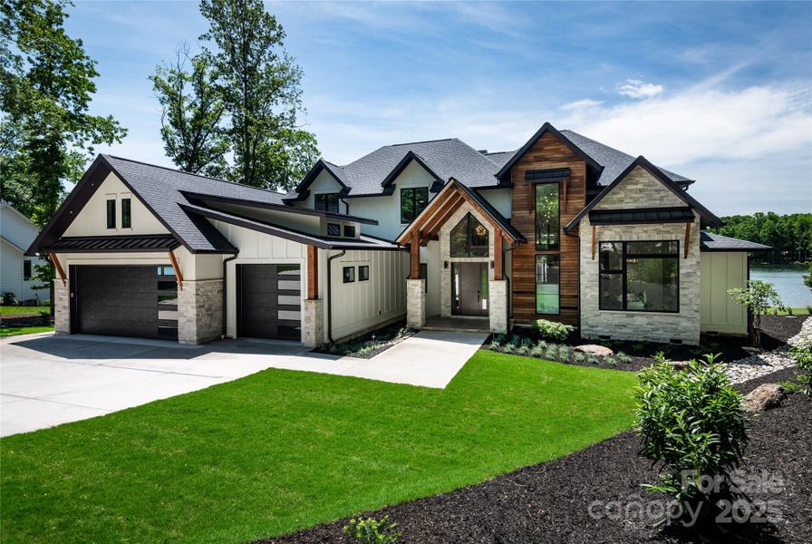 Front exterior of a new home in , Mooresville, NC, highlighting curb appeal (Image 22). Front exterior of a new home in , Mooresville, NC, highlighting curb appeal (Image 22).