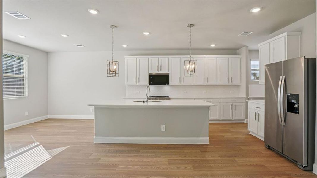 Photo is not of the actual home, but is an inspirational photo of builder’s model home and may depict options, furnishings, and/or decorator features that are not included.