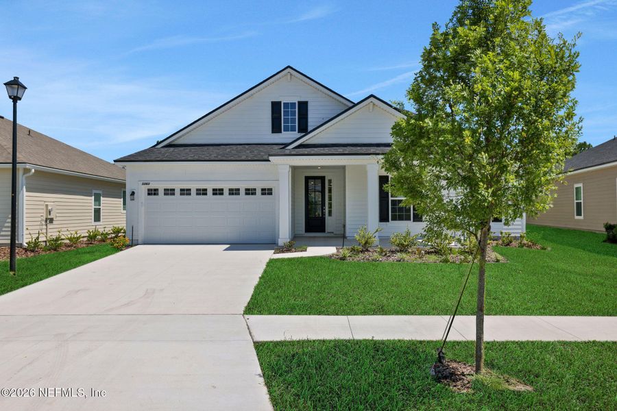 Front exterior of a new home in Hyland Trail, Green Cove Springs, FL, highlighting curb appeal (Image 26).