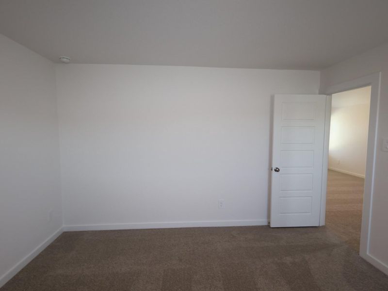 Spacious, unfurnished interior of a new home in Pinewood at Grand Texas, New Caney (Image 4).