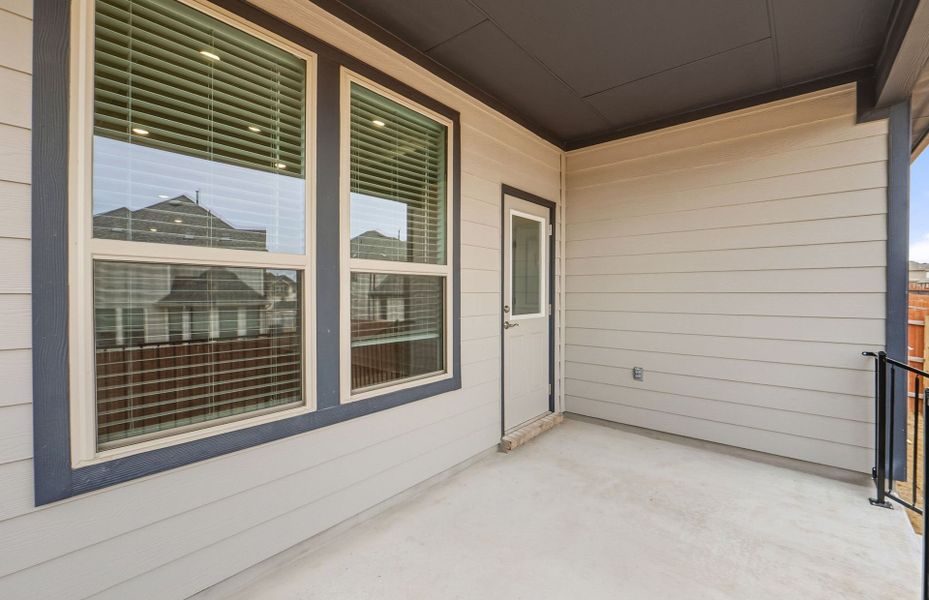 Exterior details and patio area of a home in Saddleback at Santa Rita Ranch, Liberty Hill (Image 23).