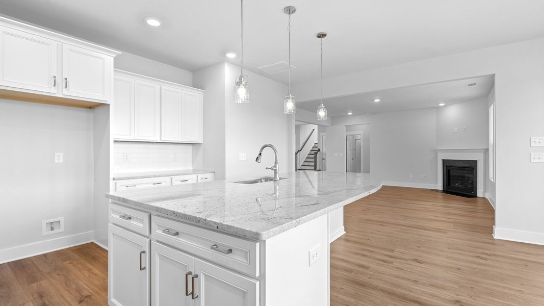 2 story single family home, all white, kitchen