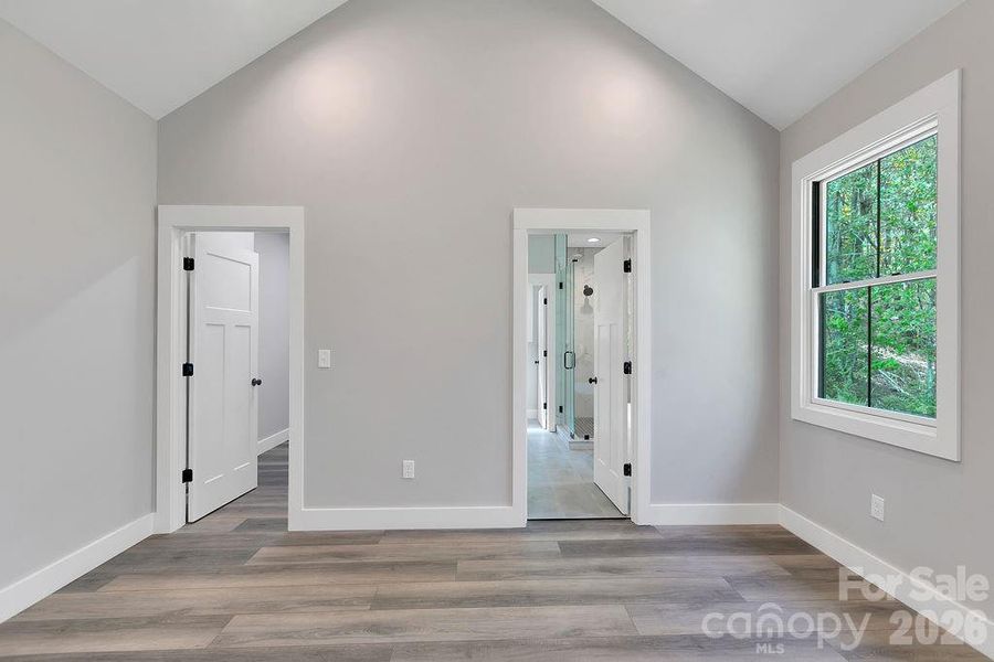 Primary Bedroom into Bath