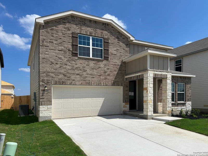 Front exterior of a new home in Enclave at Hennersby Hollow 50's, San Antonio, TX, highlighting curb appeal (Image 19). Front exterior of a new home in Enclave at Hennersby Hollow 50's, San Antonio, TX, highlighting curb appeal (Image 19).