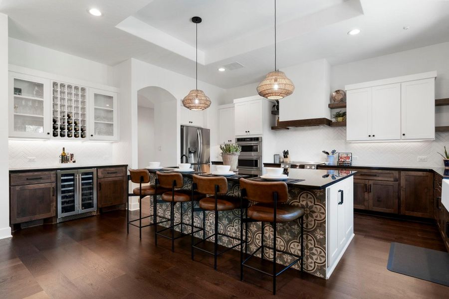 Zephyr dual temp wine fridge at the bar with wine storage. Centrally located off the kitchen island for easy entertaining. Bar sink off the kitchen island. Zephyr dual temp wine fridge at the bar with wine storage. Centrally located off the kitchen island for easy entertaining. Bar sink off the kitchen island.