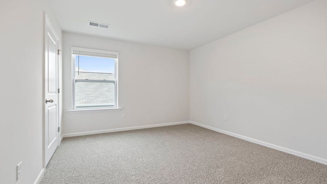 Spacious, unfurnished interior of a new home in Lakestone, Woodruff (Image 22).