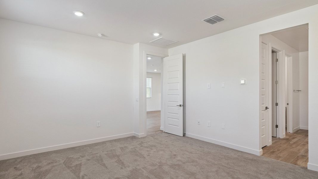 Representative unfurnished interior of a home built from the Hayden by D.R. Horton in The Ridge at Stone Butte, Phoenix (Image 35).
