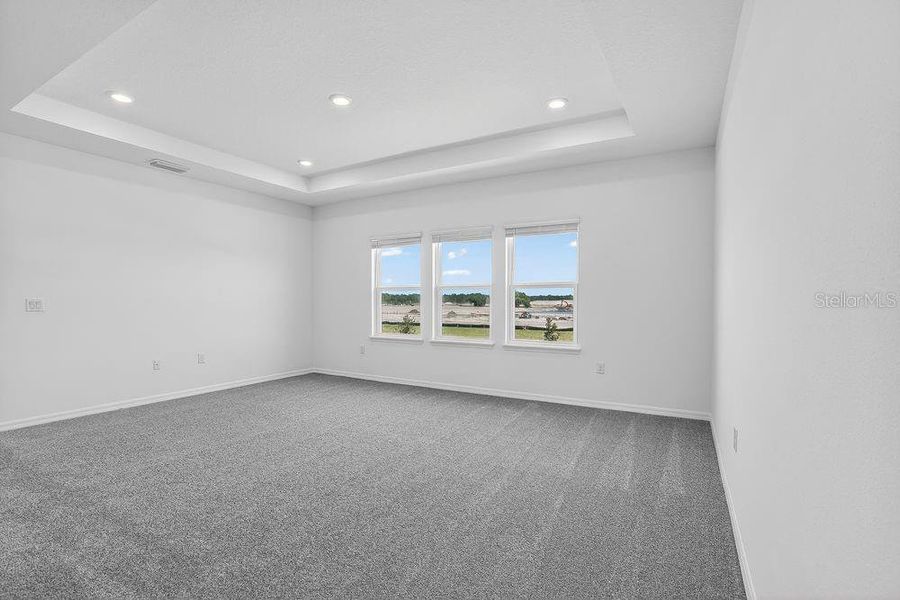 Spacious, unfurnished interior of a new home in Ardisia Park, New Smyrna Beach (Image 23).