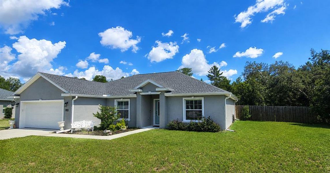 Front exterior of a new home in , Ocala, FL, highlighting curb appeal (Image 1). Front exterior of a new home in , Ocala, FL, highlighting curb appeal (Image 1).