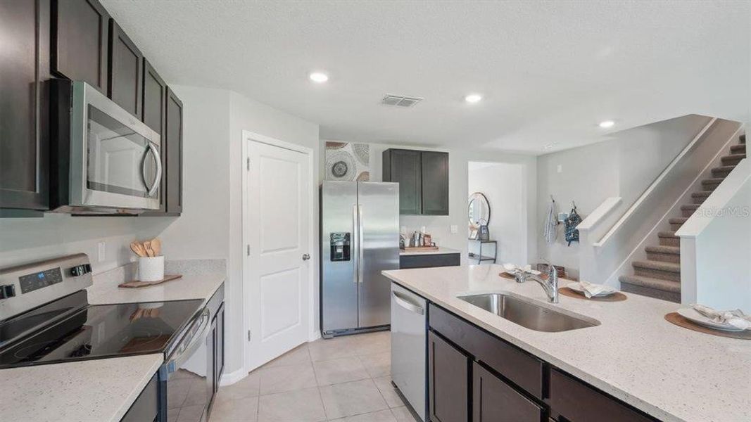Furnished interior view inside a new home in Sandhill, Dade City (Image 7). Furnished interior view inside a new home in Sandhill, Dade City (Image 7).
