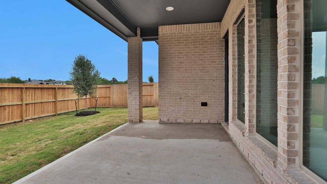 Exterior details and patio area of a home in Valencia, Manvel (Image 3). Exterior details and patio area of a home in Valencia, Manvel (Image 3).