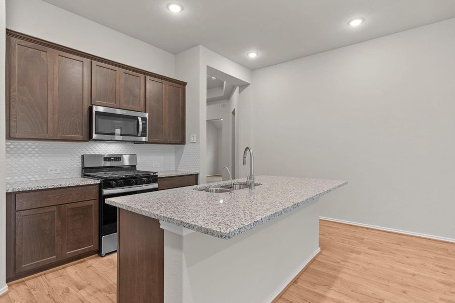 Furnished interior view inside a new home in The Highlands, Porter (Image 8).