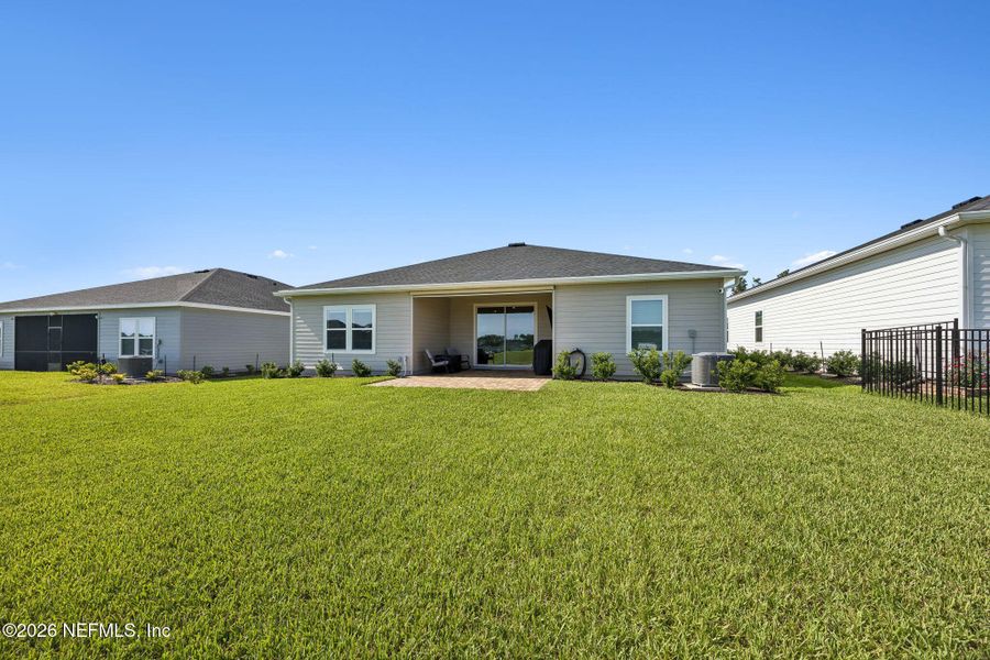 Exterior details and patio area of a home in Edenbrooke at Hyland Trail | 55+, Green Cove Springs (Image 30). Exterior details and patio area of a home in Edenbrooke at Hyland Trail | 55+, Green Cove Springs (Image 30).