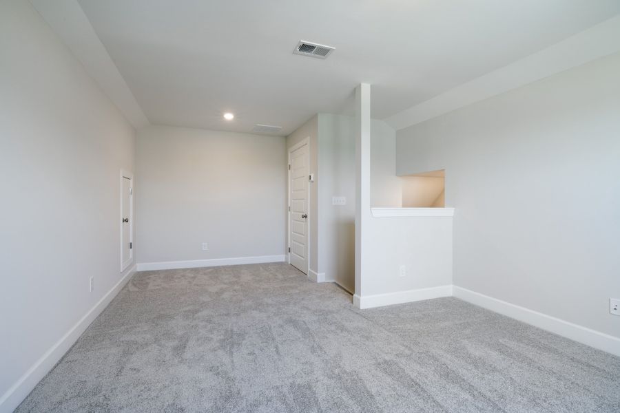 Representative unfurnished interior of a home built from the The Prescott by Cothran Homes in Holly Ridge, Greenville (Image 32).