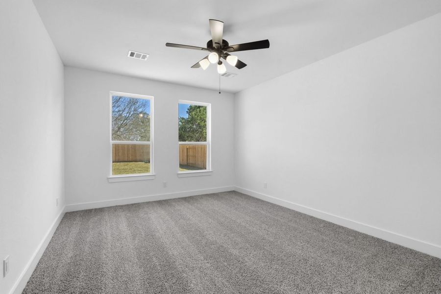 Spacious, unfurnished interior of a new home in Hunters Crossing, Sealy (Image 14).