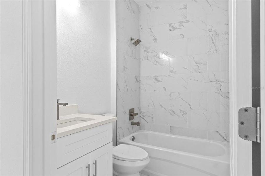 Furnished interior view inside a new home in , Dunnellon (Image 8).