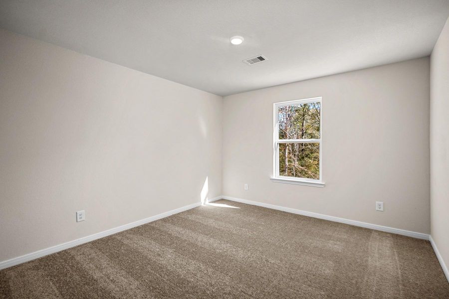 Spacious, unfurnished interior of a new home in Trails at Cochran Ranch, Waller (Image 11).