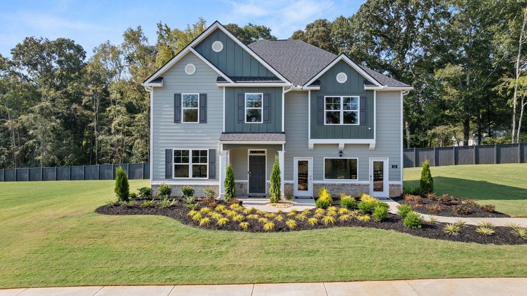 Representative exterior photo of a completed home built from the Halton by D.R. Horton in Jackson Landing, Jefferson, GA (Image 1).