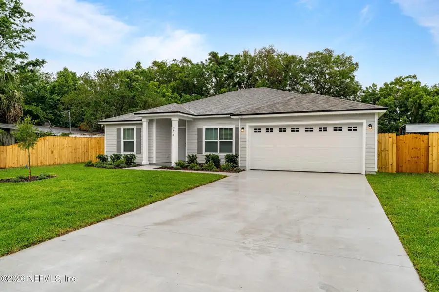 Front exterior of a new home in , Jacksonville, FL, highlighting curb appeal (Image 1). Front exterior of a new home in , Jacksonville, FL, highlighting curb appeal (Image 1).