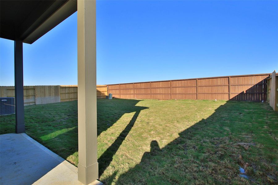 Exterior details and patio area of a home in Oakwood Estates, Waller (Image 20).