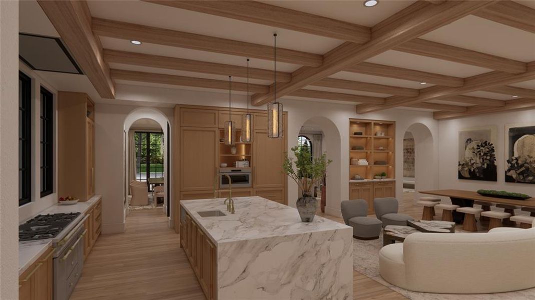 View of kitchen island with marble slab countertops into the Morning Room