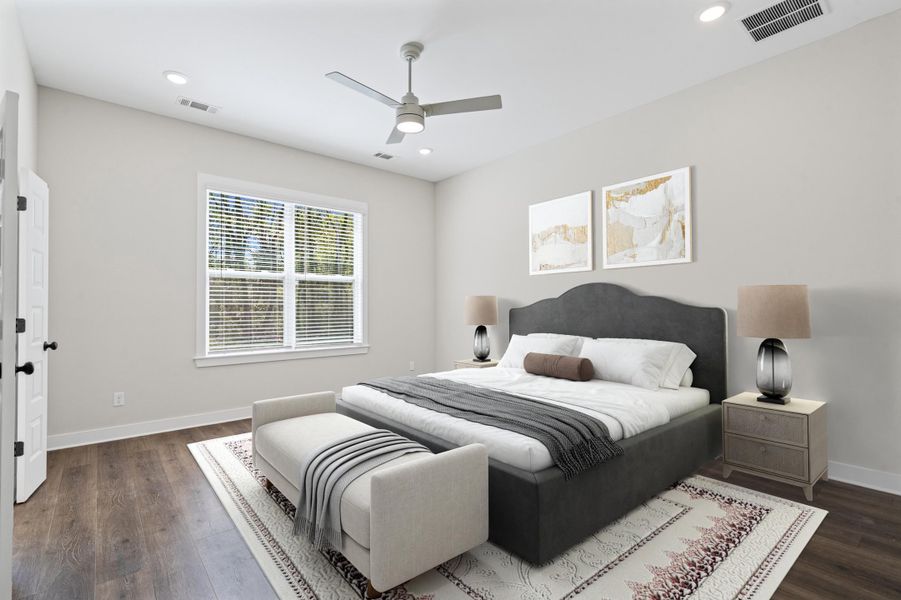 Bedroom with dark wood-type flooring, a ceiling fan, and recessed lighting Bedroom with dark wood-type flooring, a ceiling fan, and recessed lighting