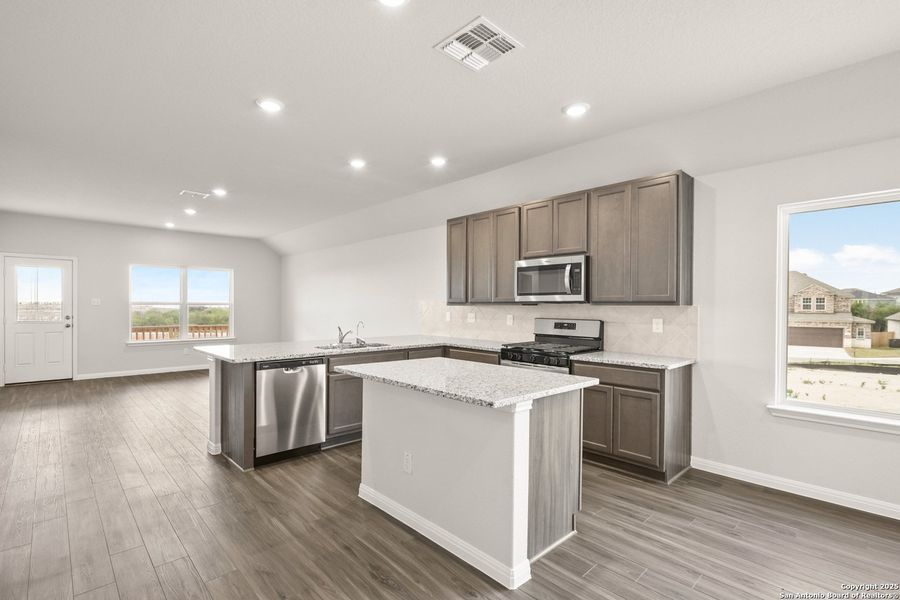 Furnished interior view inside a new home in Hunters Ranch, San Antonio (Image 7).